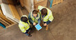 © peopleimages.com - People, tablet and team at warehouse for logistics, above or blueprint on screen at storage plant. Men, woman and tech for inventory, collaboration or floor plan for factory with meeting for shipping