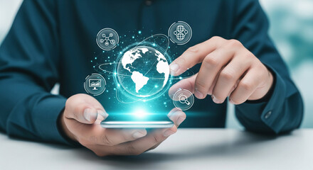 Wall Mural - person's hands holding smartphone, displaying a digital globe with network icons above, symbolizing 