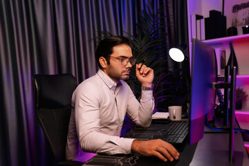 working smart it developer analyzing data software development on two pc screen, creating applicatio