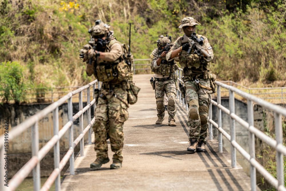 Special Forces Unit Conducting Tactical Patrol on Bridge – Armed ...