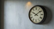 © dimas - Vintage Industrial Wall Clock on Concrete Wall