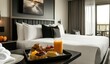 © KAHAR - Luxurious hotel room with breakfast tray on bed