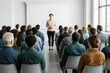 © Pixels Hunter - Professional speaker addressing diverse audience during seminar in bright modern conference room with white background and natural light setup.