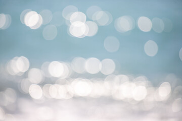 Wall Mural - the image is a blurry blue background with white circles scattered throughout