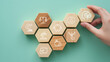 © Parradee - Holistic Wellness Concept.Wooden hexagonal blocks arranged on pastel green background with white icons; wellness and healthy living, including mental health, nutrition, exercise and community.