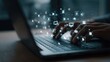 © Irwan - Hands typing on laptop, digital media icons emanating from keyboard, signifying online interaction and content creation