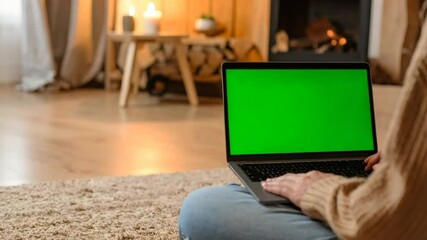Person using laptop at home