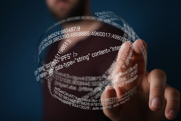 a hand interacts with a sphere of digital code, showcasing technology and programming.