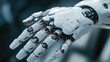 © Khan - Detailed close-up of robotic hand and fingers in futuristic design.