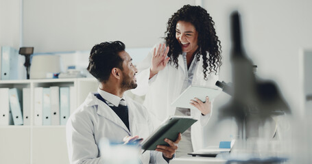 Wall Mural - happy, scientist and high five with tablet for research, medical discovery or forensic science. exci