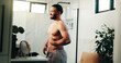 © PP/peopleimages.com - Happy man, belly and weightloss in bathroom for personal care or self confidence at home. Male person, body and topless smile with stomach fat in satisfaction for morning routine or diet at house