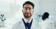 © BuyOutFelix02/peopleimages.com - Man, scientist and happy with goggles, portrait or pride for career with medical research project. Person, smile and safety glasses for pharma study, vaccine development or ppe for eyes at laboratory