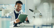 © BuyOutFelix02/peopleimages.com - Science, research and man with tablet, internet and online reading with app for vaccine development. Happy person, medical scientist and employee with email, digital tech and innovation with database