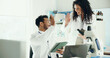 © peopleimages.com - Scientist, people or high five with tablet in lab for clinical trial success, test results and goals. Science, teamwork or celebration for medical research, breakthrough or pharmaceutical development