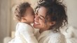 © An - The mother and child sharing a joyful moment in a cozy home setting.