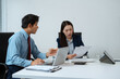 © NINENII - Project manager working and update tasks with milestones progress planning and professional investor working new start up project in the office.