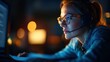 © Larisa AI - A dedicated female professional is intensely focused on her tasks, wearing a headset while working late at night on her computer, illuminated by warm screen light.