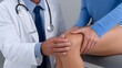 © pkproject - Doctor examining patient's knee with stethoscope in medical office