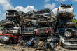 © Gordon - A pile of wrecked cars in a scrap yard