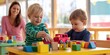 © Karyn - The joyful moment of two children playing with colorful toys.