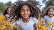 © KAYU - Joyful Girl Running Through a Field of Yellow Flowers