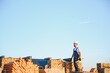 © Serhii - Man bricklayer installing bricks on construction site