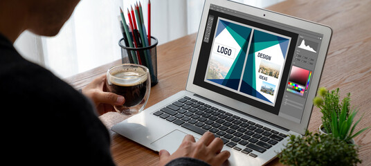 Wall Mural - graphic designer software for modern design of web page and commercial ads showing on the computer s
