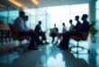 © Halim - Generative AI blurred scene of a corporate meeting in a modern office
