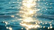 © LU - Stunning view of sunlight reflecting on the ocean waves, creating a mesmerizing display of golden bokeh. Ideal for travel - related projects, ocean - themed designs