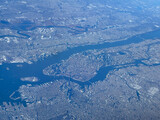 Aerial view of Manhattan, New York, a major city on the East Coast of the United States. Below you can see Governors Island in the Hudson River and the entire Manhattan 