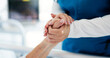 © peopleimages.com - Holding hands, caregiver and ill patient on bed in hospital for healthcare service, support and trust. Chronic disease, nurse or person with sickness at clinic for help, empathy or comfort in ward