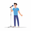 © Supanun - Singer on stage: Man sings holding microphone while standing, evoking emotion.