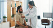 © peopleimages.com - Hospital, listening and doctor with stethoscope for man for diagnosis, consulting and breath exam. Healthcare, clinic and patient with tools for cardiology, pulmonary service and medical checkup