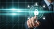 © Meow Creations - Businessman hand interacting with a glowing digital padlock interface for cybersecurity and data protection