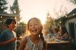 © PinkBirdDesign - Smiling family enjoying golden hour backyard barbecue, relaxed summer gathering