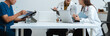 © NINENII - Medical, meeting and laptop for team in office in discussion, brainstorming and planning. Doctor, nurse and computer on desk, teamwork or workshop for data analytics.