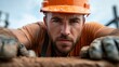 © Larisa AI - A dedicated construction worker in an orange hard hat intensely focuses on his task, demonstrating the hard work and determination required in construction and manual labor.