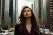 © AlparadiseDesign - A young woman gazes upward in a bustling city street.