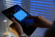 © New Africa - Email marketing, new message notification. Woman using tablet computer indoors, closeup