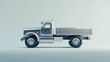 © AdamDiezel - Silver color retro truck on gray background, copy space.