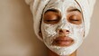 © svastix - A woman indulges in a rejuvenating face mask treatment, showcasing the essence of self-care and relaxation, promoting beauty and overall well-being amidst stress.