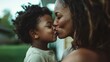 © svastix - A touching scene of a mother and child sharing a tender kiss, capturing the essence of love, warmth, and connection in a natural setting, highlighting their bond.