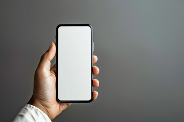 Vibrant Color Image of Hand Holding Horizontal Mobile Phone with White Screen