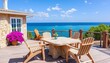 © chanasorn - Stone patio table and deck chairs on coastal house deck, sunny day, real estate, patio furniture