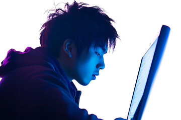 Young Man Concentrated on Laptop Screen Blue Neon Light Profile View Technology Digital World