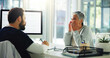 © peopleimages.com - Doctor, patient and consultation with sinus for medical treatment, diagnosis or symptoms at clinic. Man, woman and sick client talking with healthcare worker for blocked nose or nasal inflammation