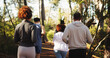© Azeemud/peopleimages.com - Marathon, group and back in forest for fitness, workout and endurance for performance. Cardio club, running and jog together for competition, practice and team exercise for pace training challenge