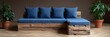 © fotogurme - Reclaimed wood sofa with navy cushions, embodying rustic chic for Earth Day serenity and Scandinavian hygge aesthetics celebration