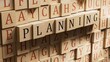© bo - Planning.wooden blocks spelling.Flat lay view from above on wooden background with wooden blocks buttons.IT technology concept.3D rendering on wooden background.