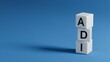 © bo - Lettering adi on wooden elements.close up of wooden elements,Business Concept.3D rendering on blue background.